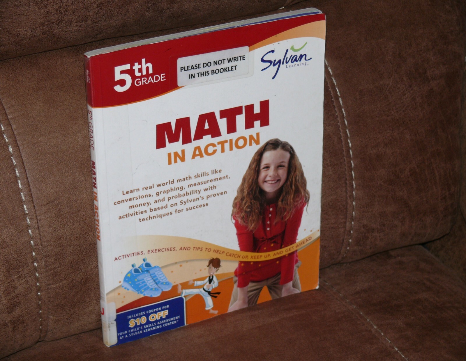 Math Workbooks Ser.: Fifth Grade Math in Action (Sylvan Workbooks) by Sylvan…